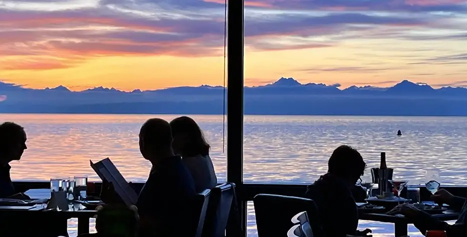 Guests dining at Ray’s Boathouse seafood restaurant and bar on the Seattle waterfront