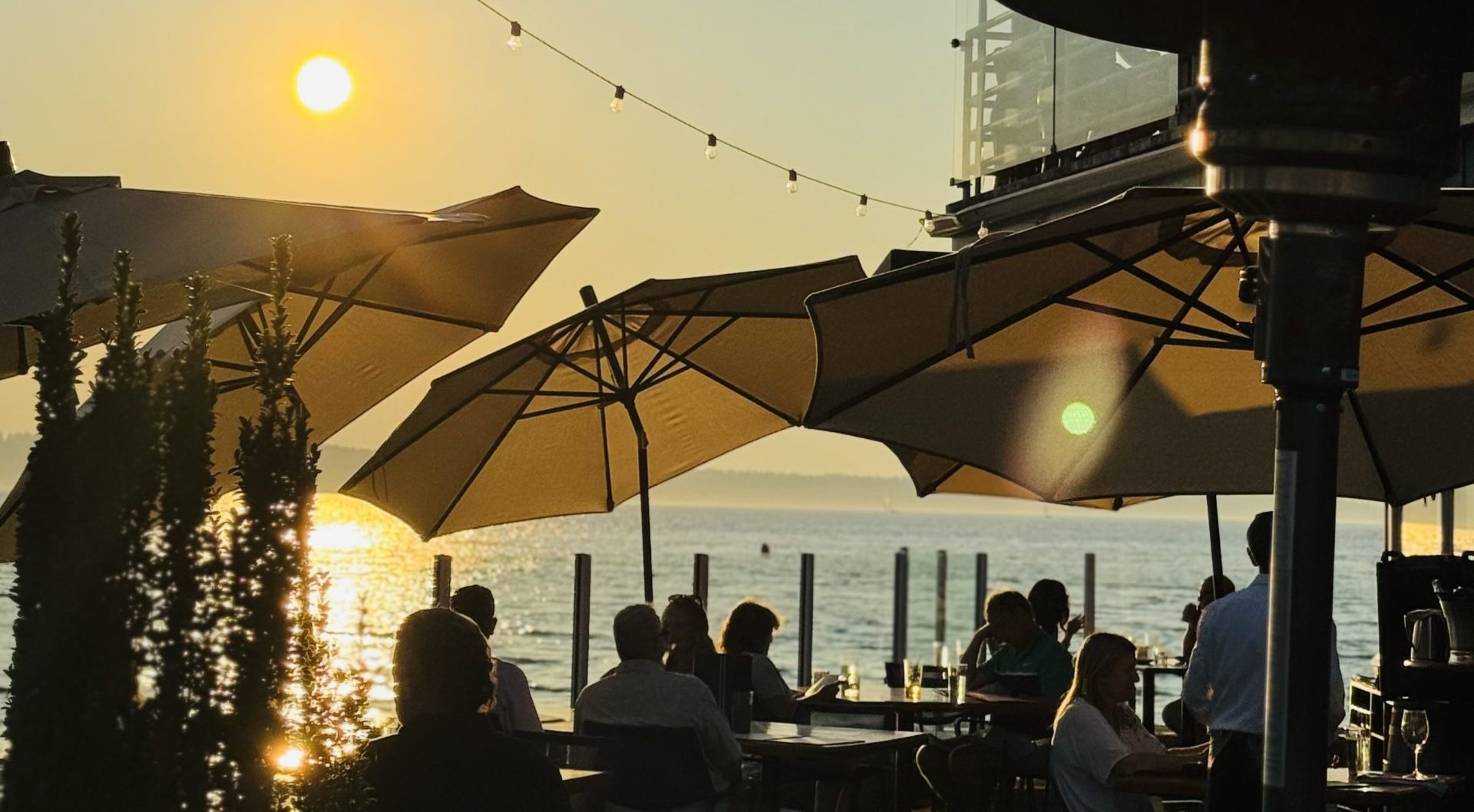 Guests dining on Ray's Boathouse deck